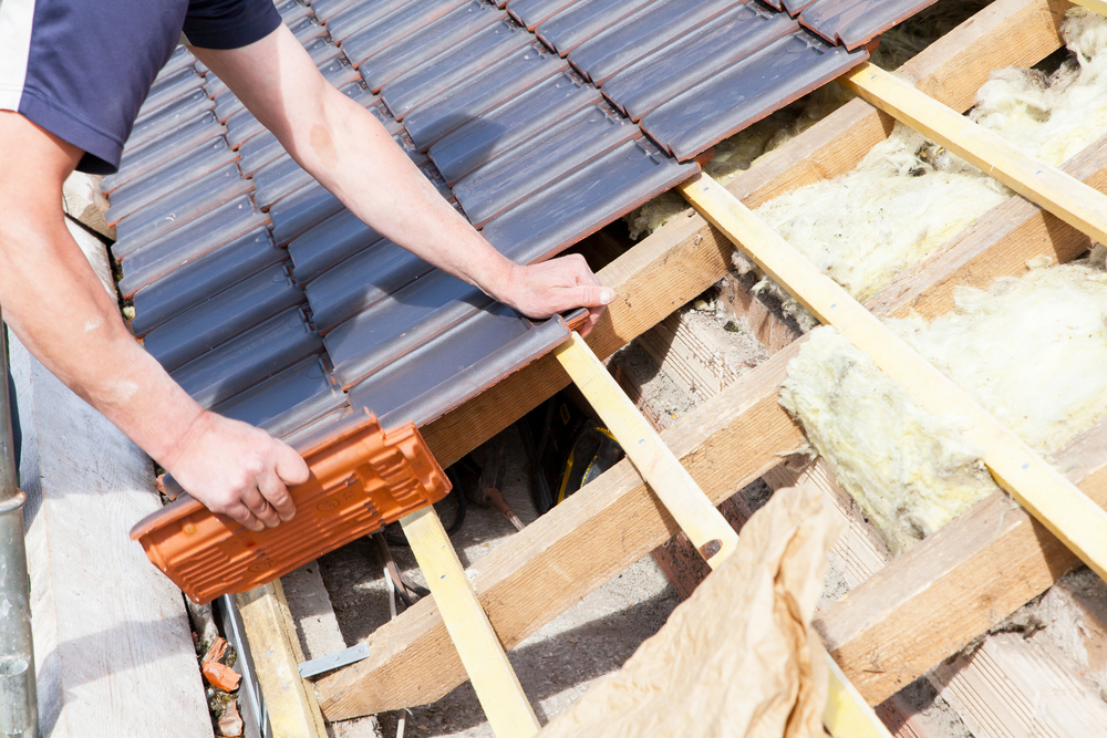 The Difference Between Reroofing and Roof Replacement
