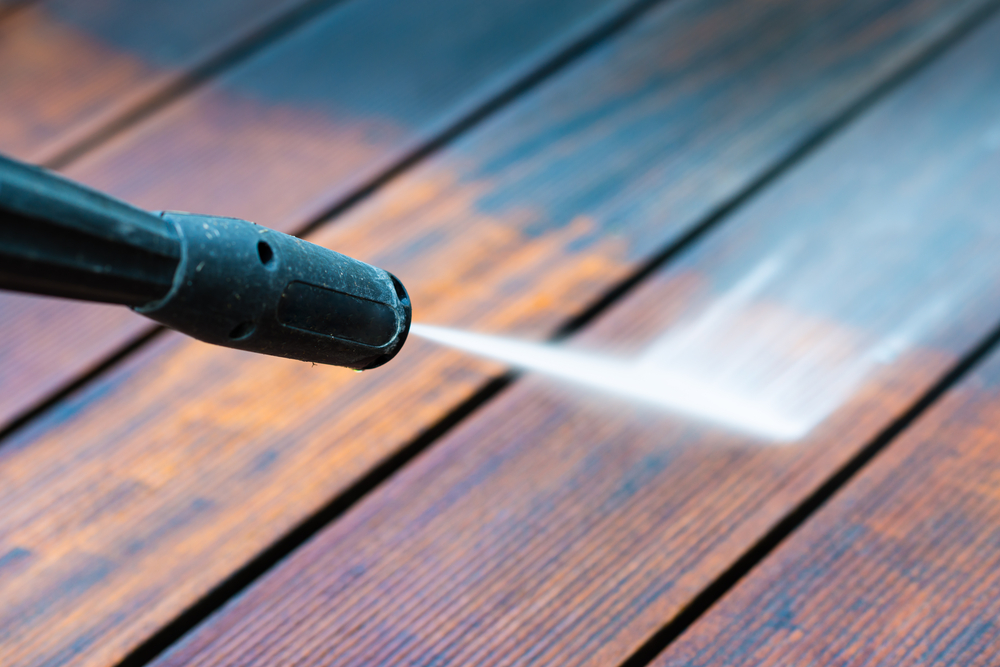 cleaning deck with power washer