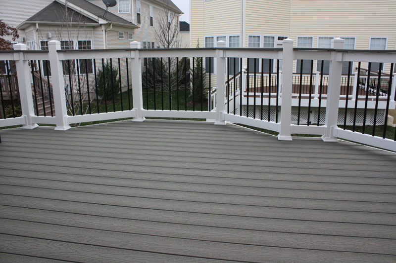Light gray composite deck with white railings