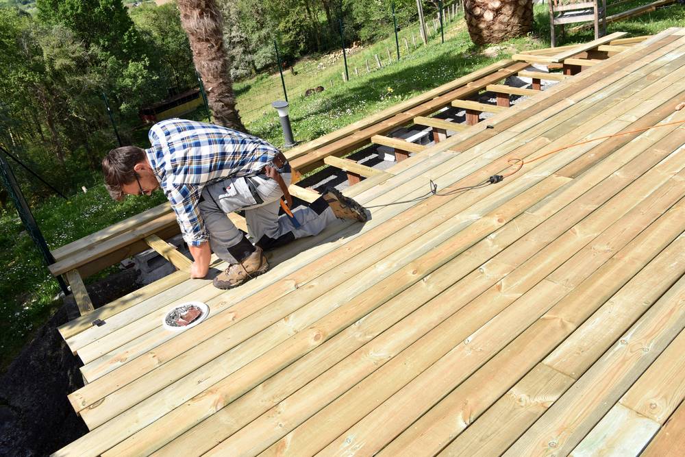 carpenter building deck