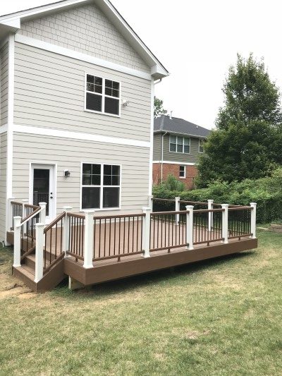 composite deck on beige house