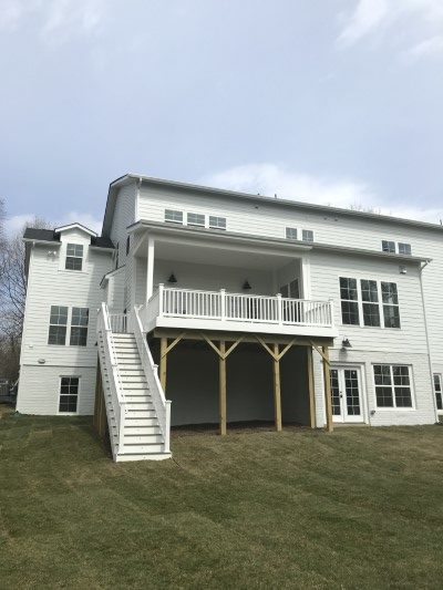 covered deck with stairs