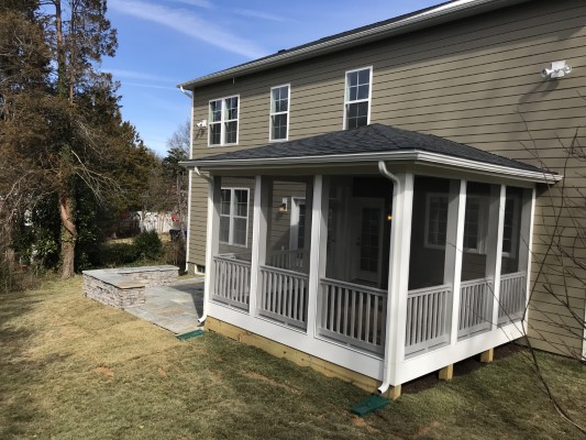 screen porch with patio