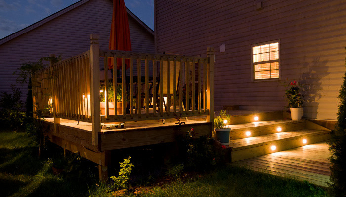 Beautiful deck with nice lighting on a home