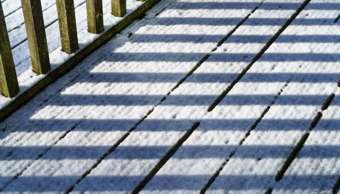 deck with thin snow in the morning