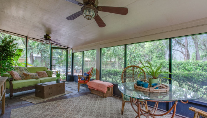 beautiful screened in back porch in a house in the morning