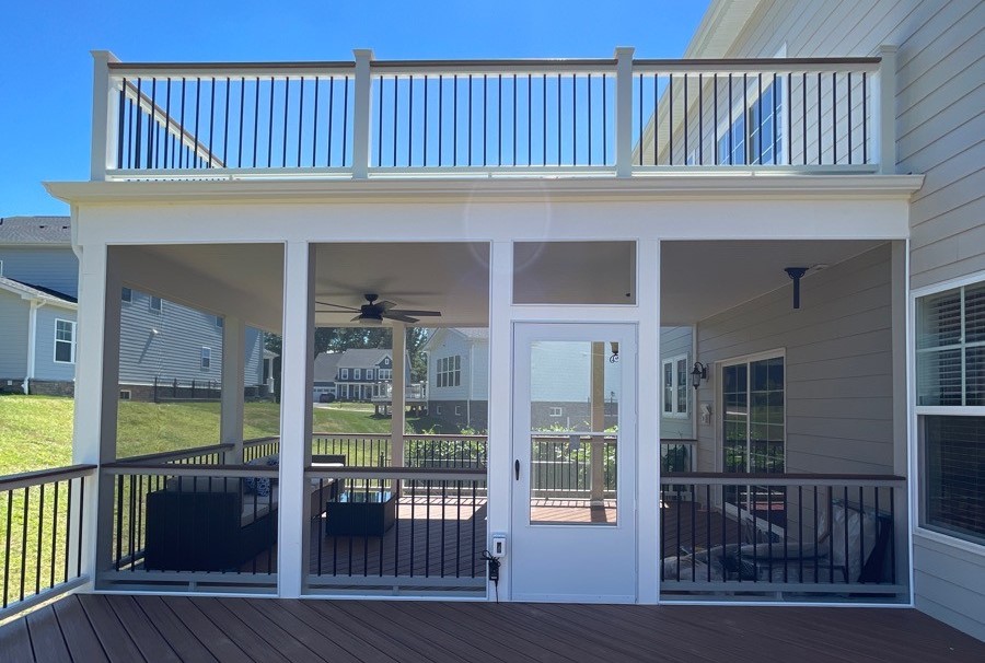 Screened porch in a beautiful home during summer season